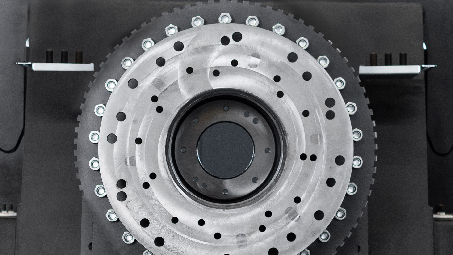 Assembly fixture for a Genesis shear showing the main shaft, bearing and bolted components