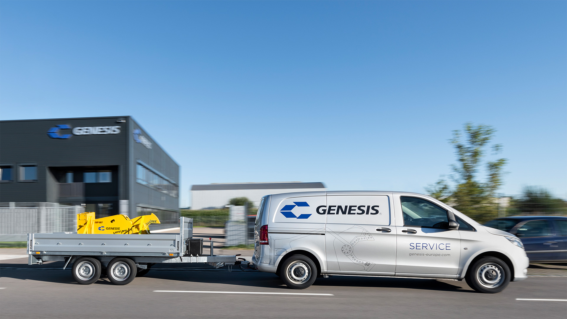 Genesis service vehicle with trailer and hydraulic shear outside the company site in Memmingen